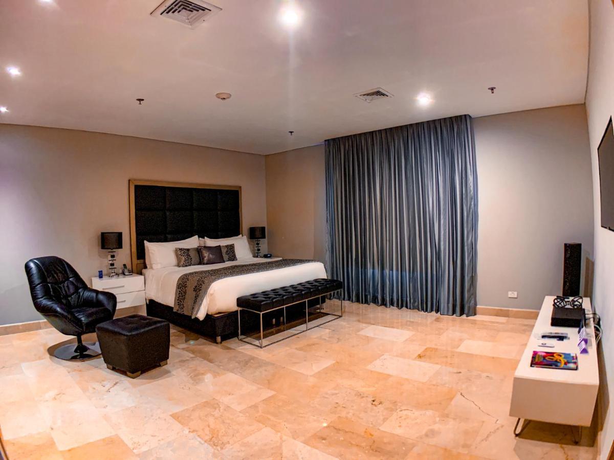 Hotel Dann Carlton Barranquilla Y Centro De Convenciones المظهر الخارجي الصورة A bedroom at the hotel