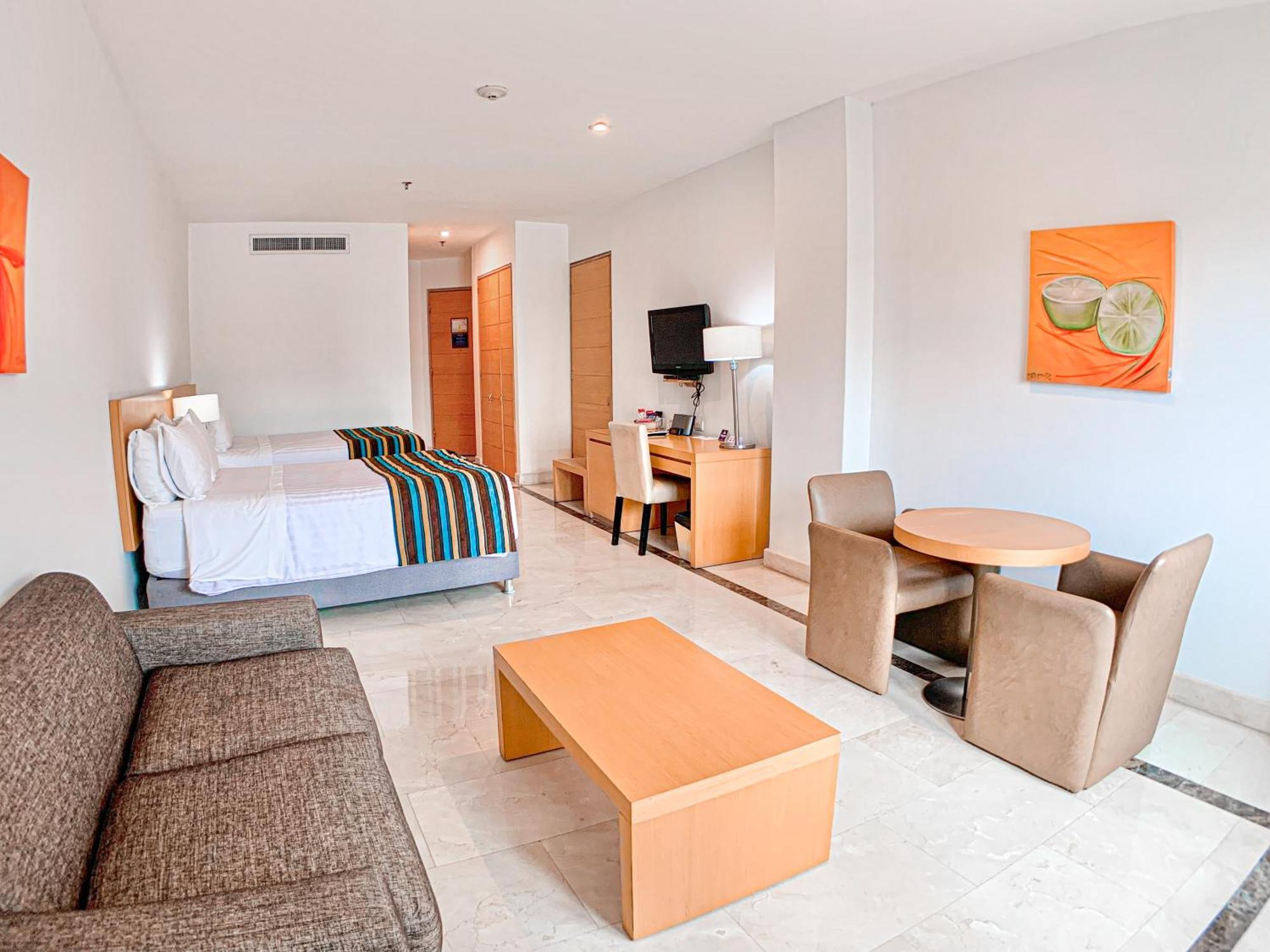 Hotel Dann Carlton Barranquilla Y Centro De Convenciones المظهر الخارجي الصورة A room at the hotel